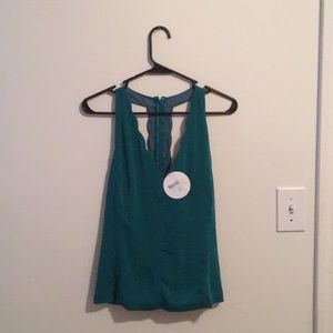 Cute boutique green tank with scalloped pattern
